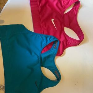 pink and blue nike sport bras